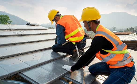Two Workers Repairing Roof